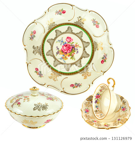 Elegant antique porcelain dishes on a white background. 131126979