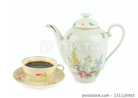 An antique porcelain coffee set on a clean white background. 131126983
