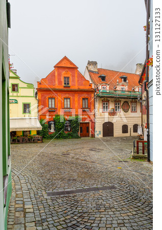 A charming view of narrow streets and old Baroque buildings in Cesky Krumlov, showcasing the towns historic character, architectural beauty, and timeless atmosphere A charming view of narrow streets and old Baroque buildings in Cesky Krumlov, showcasing the towns historic character, architectural beauty, and timeless atmosphere 131127133