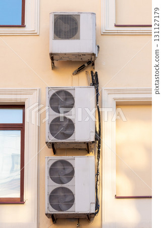 Air conditioners on the facade of the house, ventilation and cooling system. 131127179