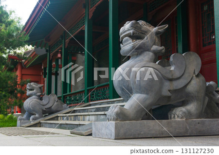 Chinese lion statues at the entrance to the pavilion Chinese lion statues at the entrance to the pavilion 131127230