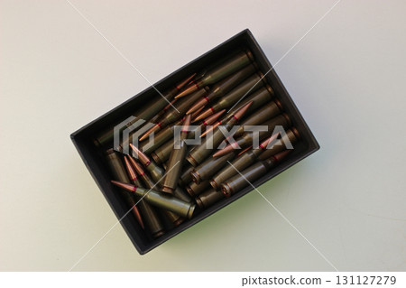 Bullets In Black Box Scattered Isolated On White Stock Photo  131127279