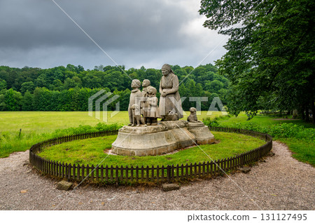 The statue of the Grandmother with her grandchildren in Babiccino Valley is a beloved landmark symbolizing family and heritage, surrounded by picturesque nature and reflecting Bozena Nemcova's 131127495