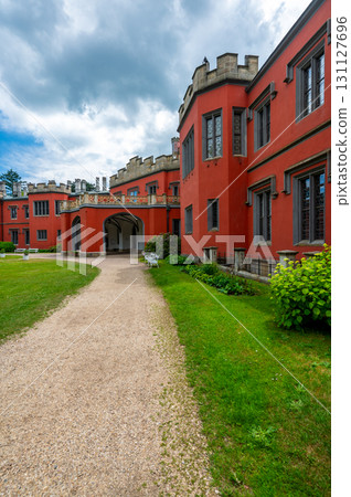 Romantic castle with red facade. Hradek u Nechanic. Czech Republic. Nechanice. Panoramic exterior view. Romantic castle with red facade. Hradek u Nechanic. Czech Republic. Nechanice. Panoramic exterior view. 131127696