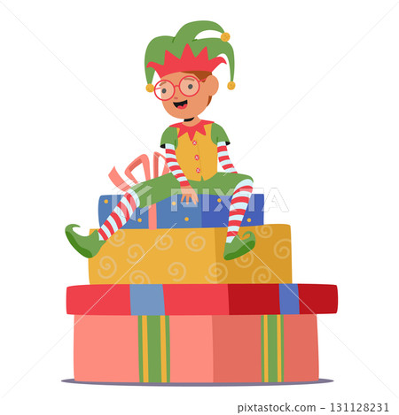 Joyful boy Christmas elf cartoon character sitting on wrapped gift boxes stack isolated on white 131128231