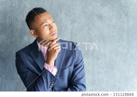 Thinking black businessman 131128668
