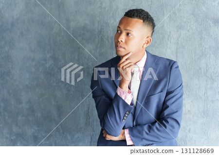 Thinking black businessman Thinking black businessman 131128669