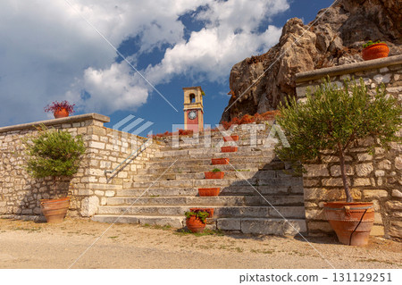 Old Fortress clock tower in Corfu Greece on sunny day 131129251