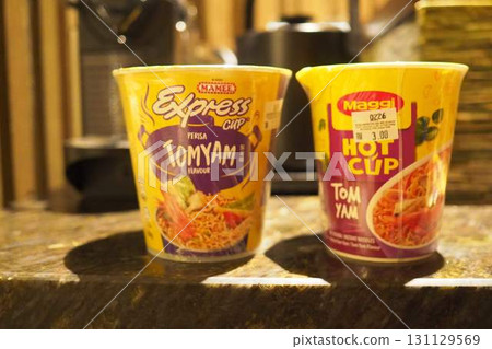 Late-night cup noodles in a hotel room 131129569