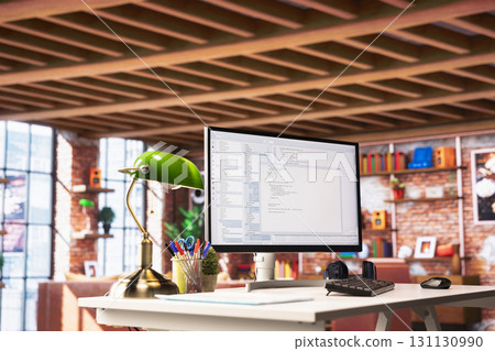 UI on PC screen in home office with programming code being executed. Coding application on computer display used by IT programmer to write and test code in modern apartment UI on PC screen in home office with programming code being executed. Coding application on computer display used by IT programmer to write and test code in modern apartment 131130990