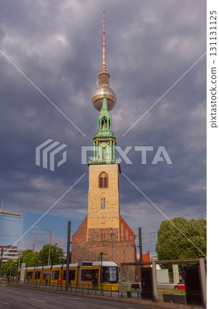 St Marys Church and Berlin TV Tower in Berlin Germany at sunset 131131125