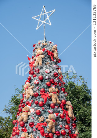Group of ornaments decorated on Christmas tree during Christmas festival and New Year celebration. 131132769