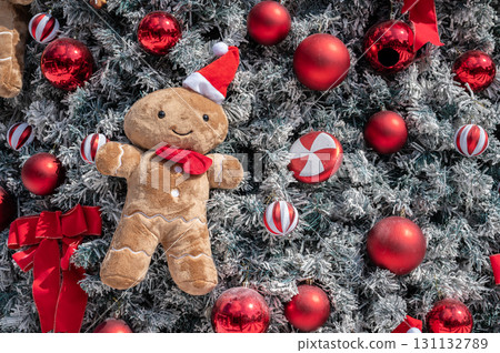 Cute soft doll decorated on Christmas tree during Christmas festival and New Year celebration. 131132789