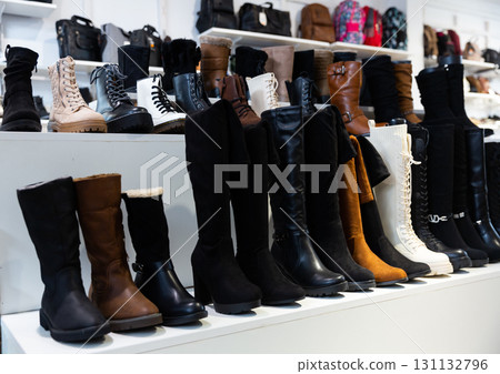 Diversity of boots in shop 131132796