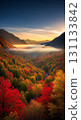 Autumn leaves and a sea of clouds in the morning glow 131133842