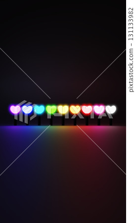 Colorful heart-shaped penlight on a black background. 3D (vertical) 131133982
