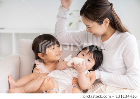 Mom, girl and baby 131134416