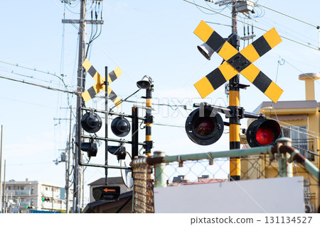Railroad crossing traffic lights and blue sky Railroad crossing traffic lights and blue sky 131134527