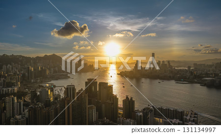 Aug 1 2025 Scenic Golden Hour View of Victoria Harbour Skyline 131134997
