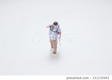 a Miniature Explorer Photographer With Backpack, Camera, 131135041