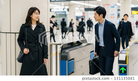 A young woman waiting for him at the ticket gate. Meeting. 131135081