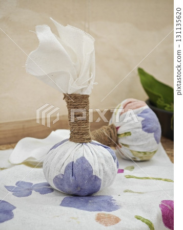 Herbal compress or hot compress. Herbal compress or hot compress. 131135620