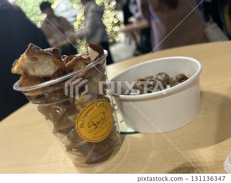 Mushrooms and baked pretzels at a German Christmas market Mushrooms and baked pretzels at a German Christmas market 131136347