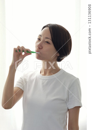 Tooth brushing woman image 131136908
