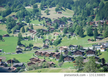 A midsummer view of the countryside outside Zermatt, Switzerland, from the window of the Swiss mountain railway (Gornergratbahn) 131138805