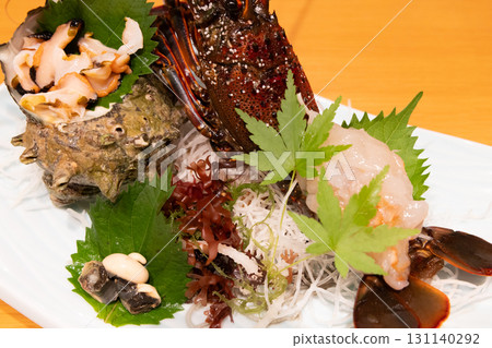 Delicious spiny lobster and turban shell sashimi Delicious spiny lobster and turban shell sashimi 131140292
