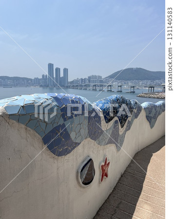 Scenery of a seaside promenade with a view of the harbor Scenery of a seaside promenade with a view of the harbor 131140583