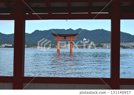 The great torii gate seen from the main hall of Itsukushima Shrine The great torii gate seen from the main hall of Itsukushima Shrine 131140957