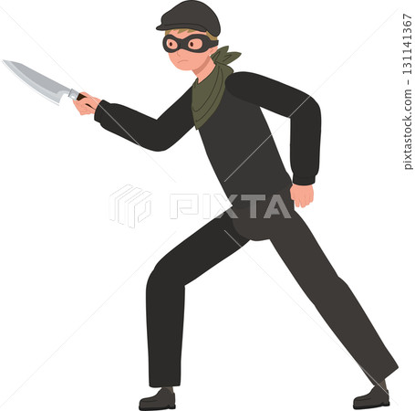 a robber thief in black clothing holding knife showing criminal a robber thief in black clothing holding knife showing criminal 131141367
