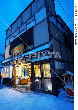 Otaru, Hokkaido in winter - Rishiriya Monoya on Sakaimachi Main Street at night 131142042
