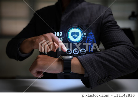 Digital health monitoring technology concept with wearable device tracking vital signs and performance 131142936