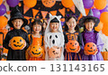 Children enjoying Halloween costumes 131143165