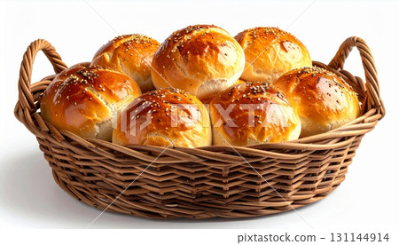 Golden Brown Buns in Woven Basket with Sesame Seeds on White Background 131144914