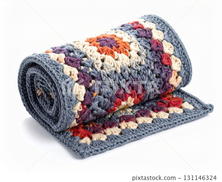 Rolled Knitted Crochet Blanket with Various Color Squares on White Background Rolled Knitted Crochet Blanket with Various Color Squares on White Background 131146324