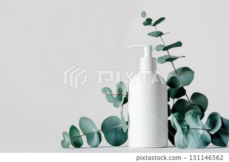 Mockup white bottle with dispenser for cleanser, soap on a white background. Packaging of cosmetic products. Copy space. 131146562