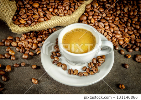 Espresso coffee cup with beans burlap sack Espresso coffee cup with beans burlap sack 131146866