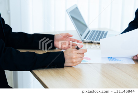 Two businessmen having a meeting 131146944