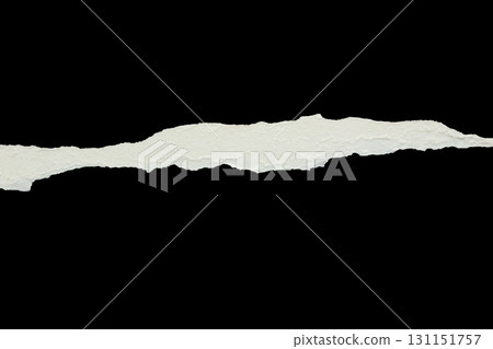 Ripped torn paper edges isolated on black background Ripped torn paper edges isolated on black background 131151757