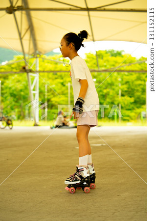 Asian teen girl roller skating. Roller-skating. Korea 131152115