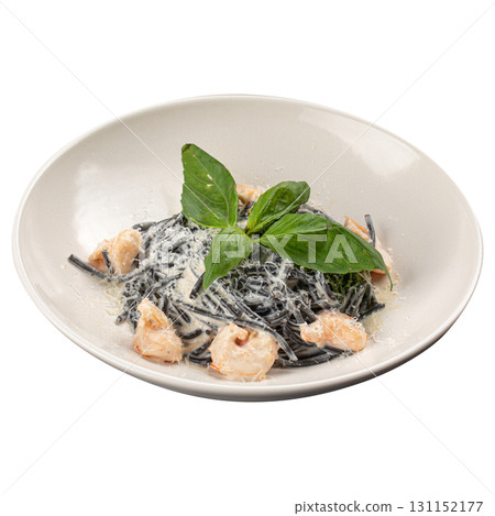 Isolated black pasta with shrimp and parmesan cheese 131152177