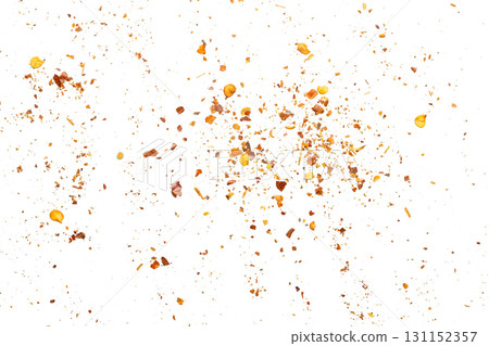 dried red chili pepper flakes and seeds isolated on white background dried red chili pepper flakes and seeds isolated on white background 131152357