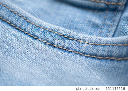 Old denim blue jeans fabric texture background close up Old denim blue jeans fabric texture background close up 131152516