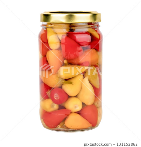 pickled yellow and red peppers in a glass jar on an isolated white background 131152862
