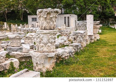 Fragmented Corinthian column capitals and ancient marble artifacts on display at archaeological site in Izmir, Turkey Fragmented Corinthian column capitals and ancient marble artifacts on display at archaeological site in Izmir, Turkey 131152897