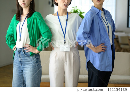 Angry Japanese women lining up in the office 131154189