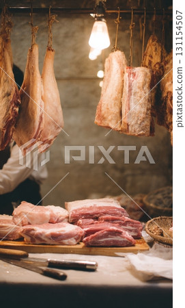 Fresh cuts of meat displayed in a traditional butcher shop highlighting the return of meat consumption Fresh cuts of meat displayed in a traditional butcher shop highlighting the return of meat consumption 131154507